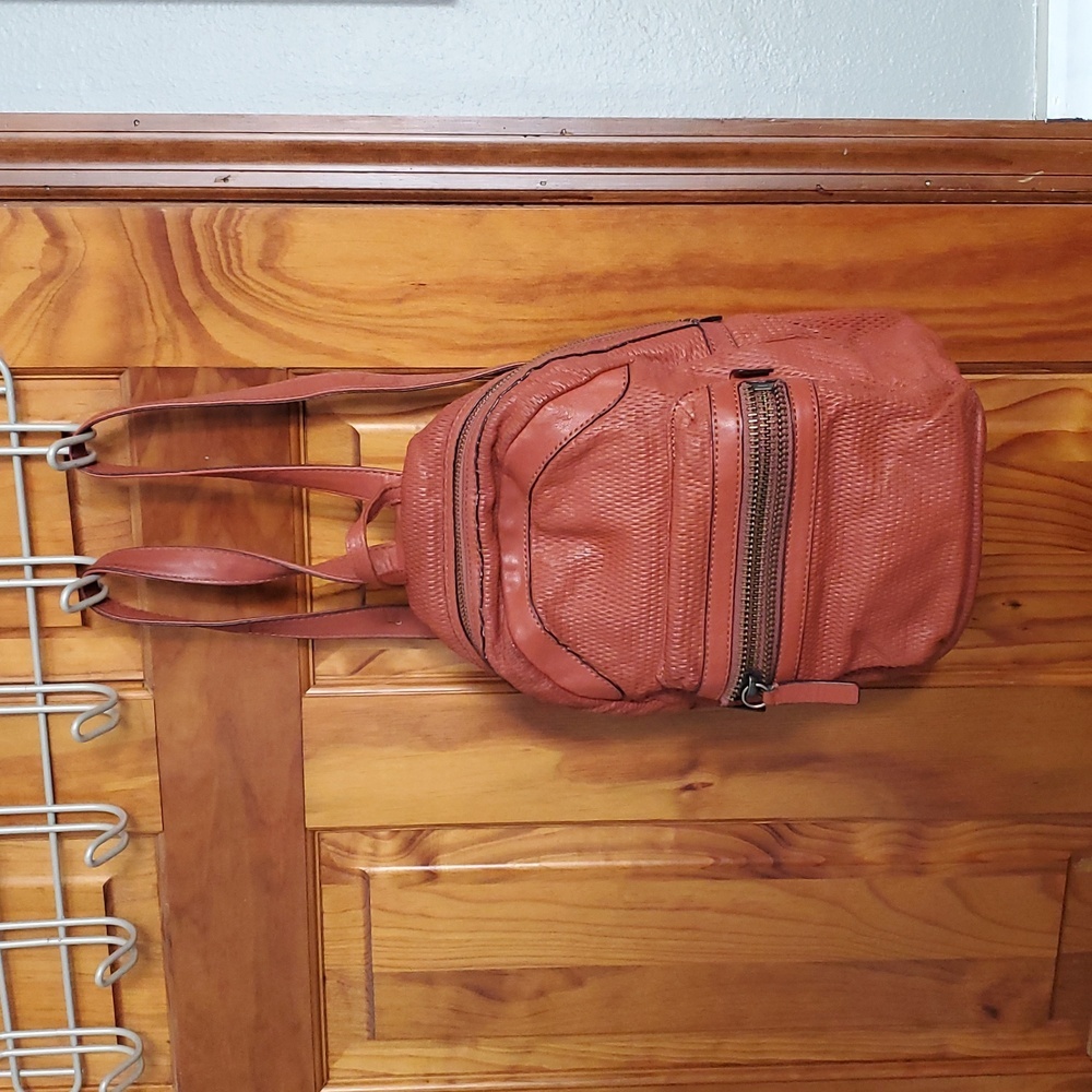 Frye burnt orange mesh pattern leather backpack with front zip pocket